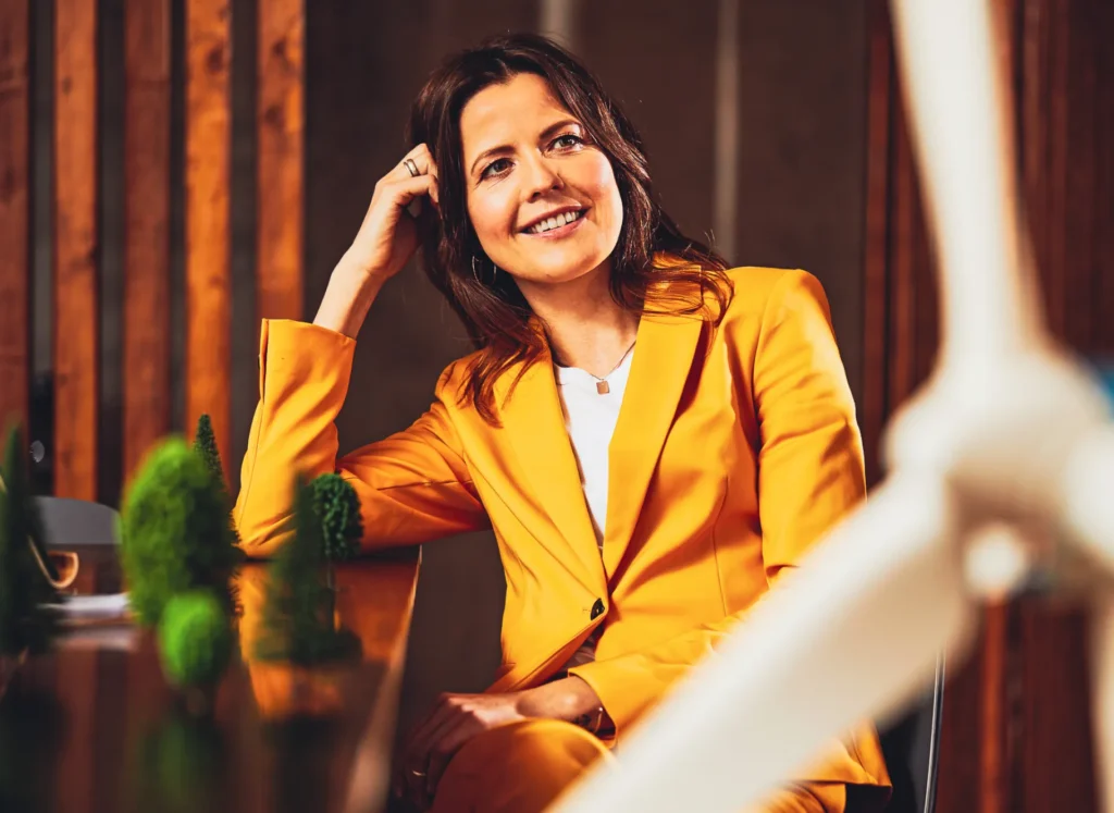 A woman listening to someone talk